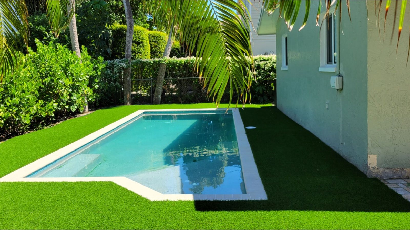 After: a narrow backyard pool finished by Golf Coast Sports